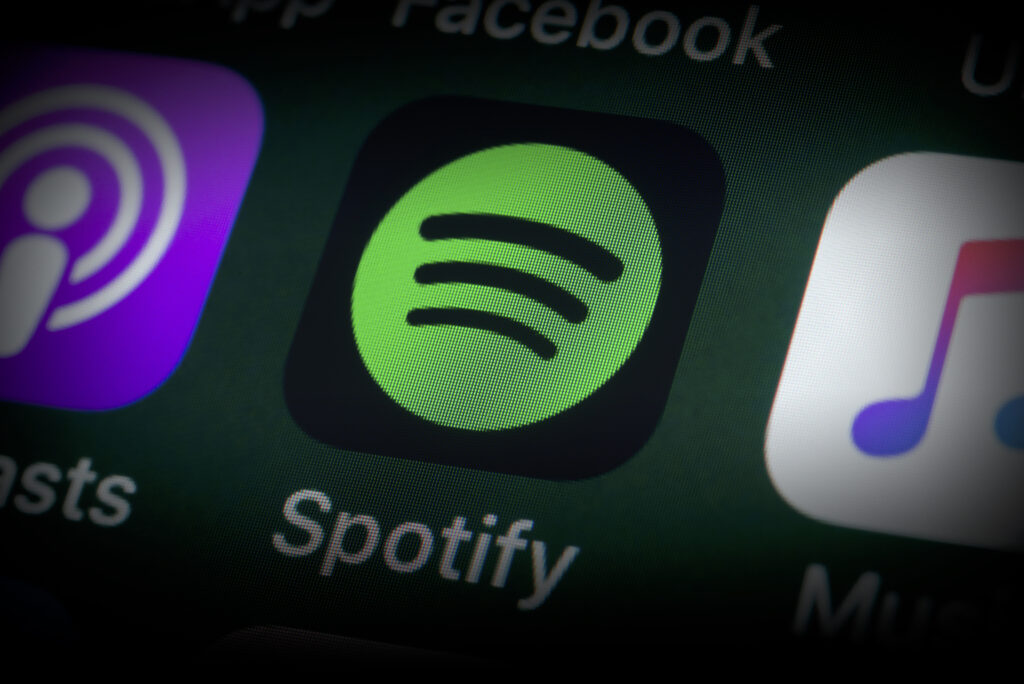 Spotify, Podcasts, Music and other Apps on iPhone screen